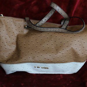 Tan and white guess purse